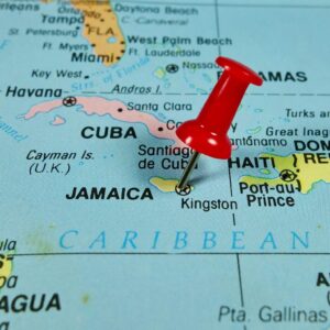 Pushpin,Marking,On,Jamaica,Map
